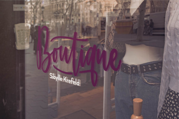 Aufkleber Boutique Schriftzug Schaufenster